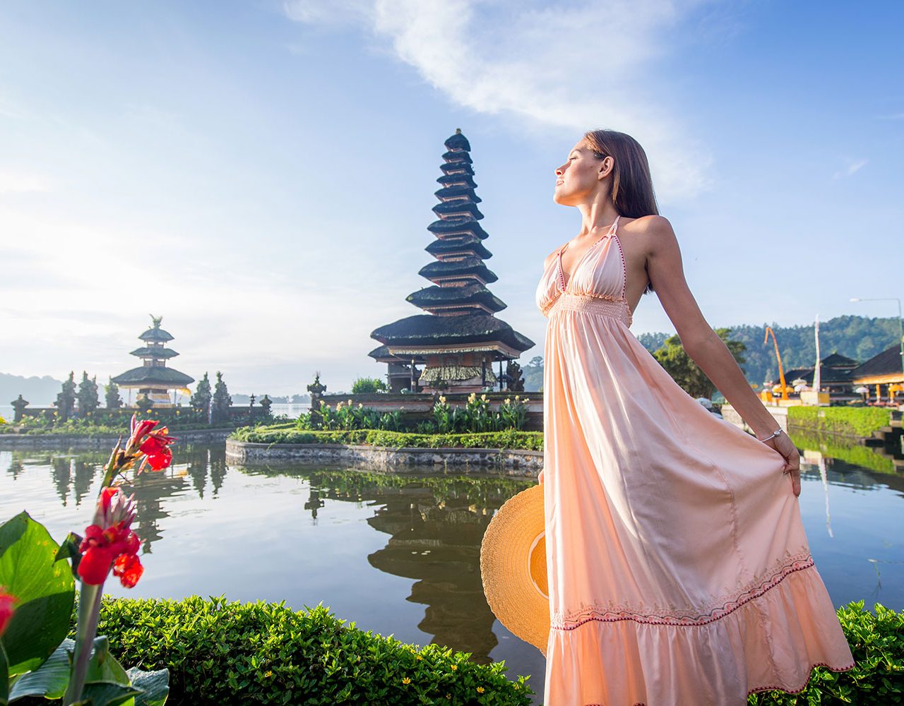 young-woman-at-the-pura-ulun-danu-bratan-bali-2021-09-01-17-16-55-utc